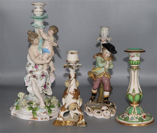 2 ceramic figural candlestick holders and 2 others